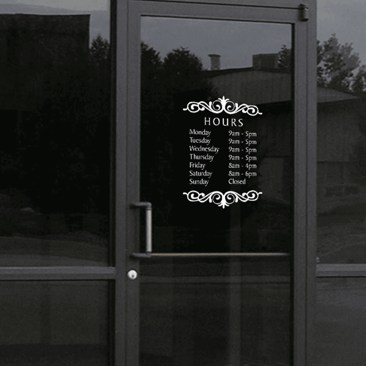 Baker Die Cut Hours of Operation Decal on a storefront window