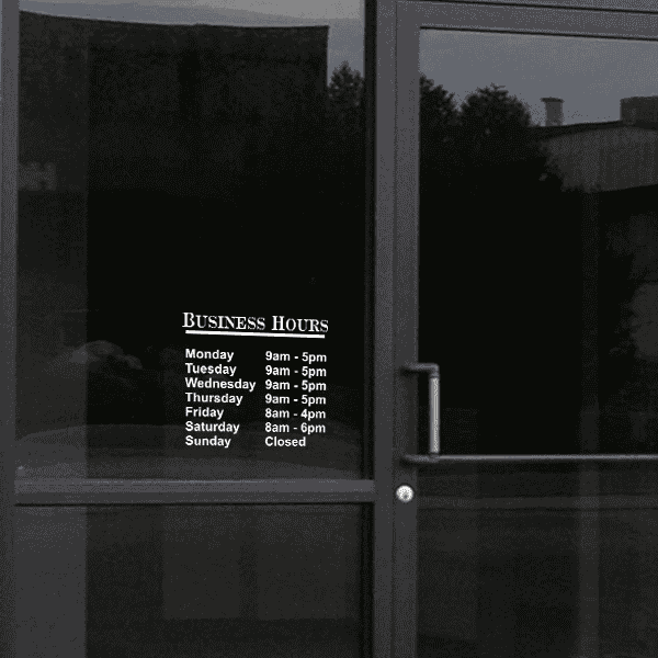 Standard Business Hours Die Cut Door Decal on a storefront window