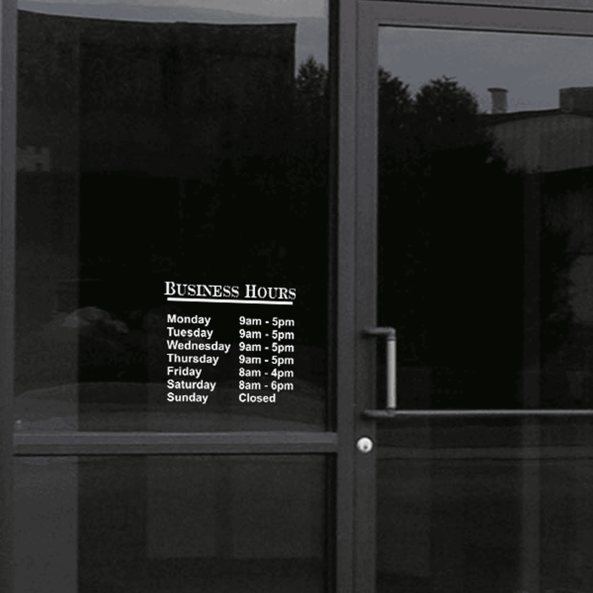 Standard Business Hours Die Cut Door Decal on a storefront window