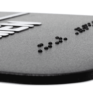Close up of the braille on the sign