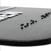 Close up of the Braille on an ADA sign