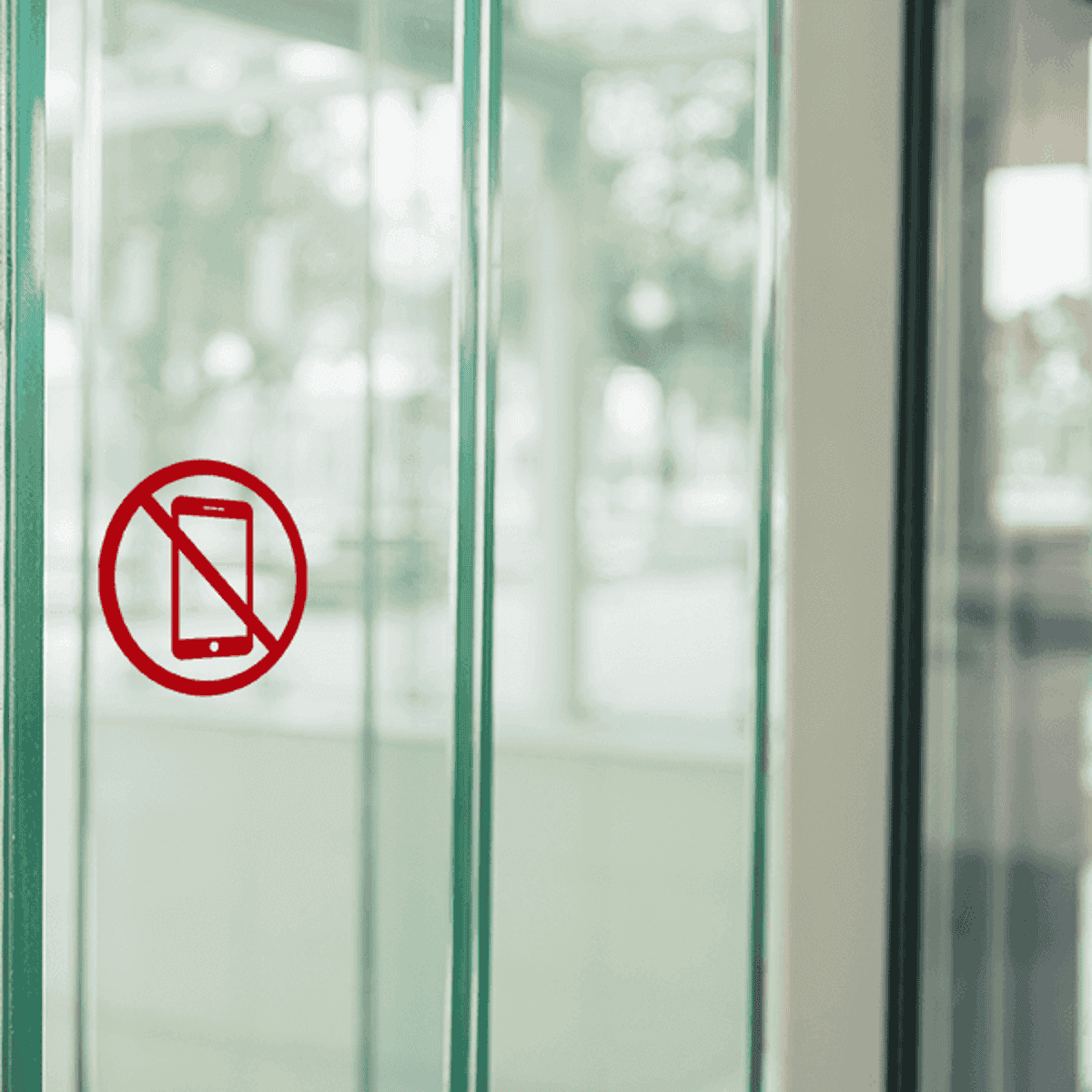 6" Round No Cell Phone Die Cut Vinyl Decal on a store window