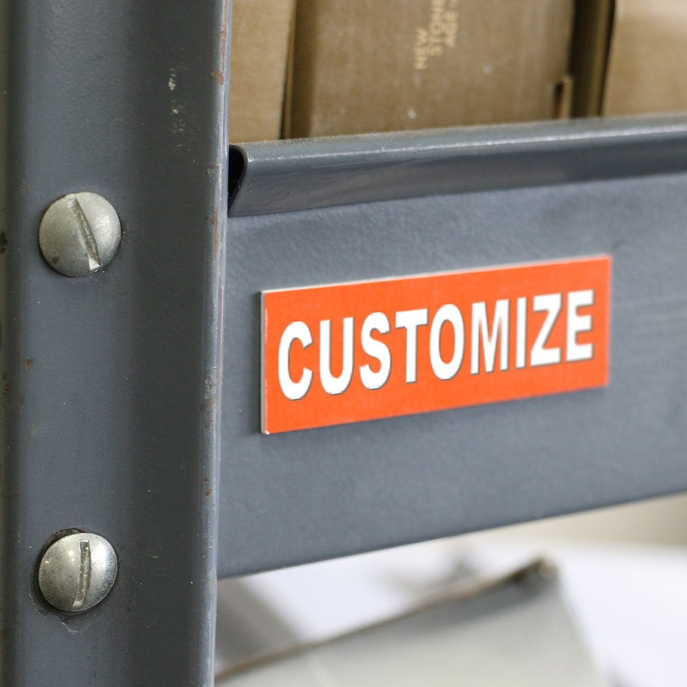 1x3 small engraved plastic sign with "customize" written on it