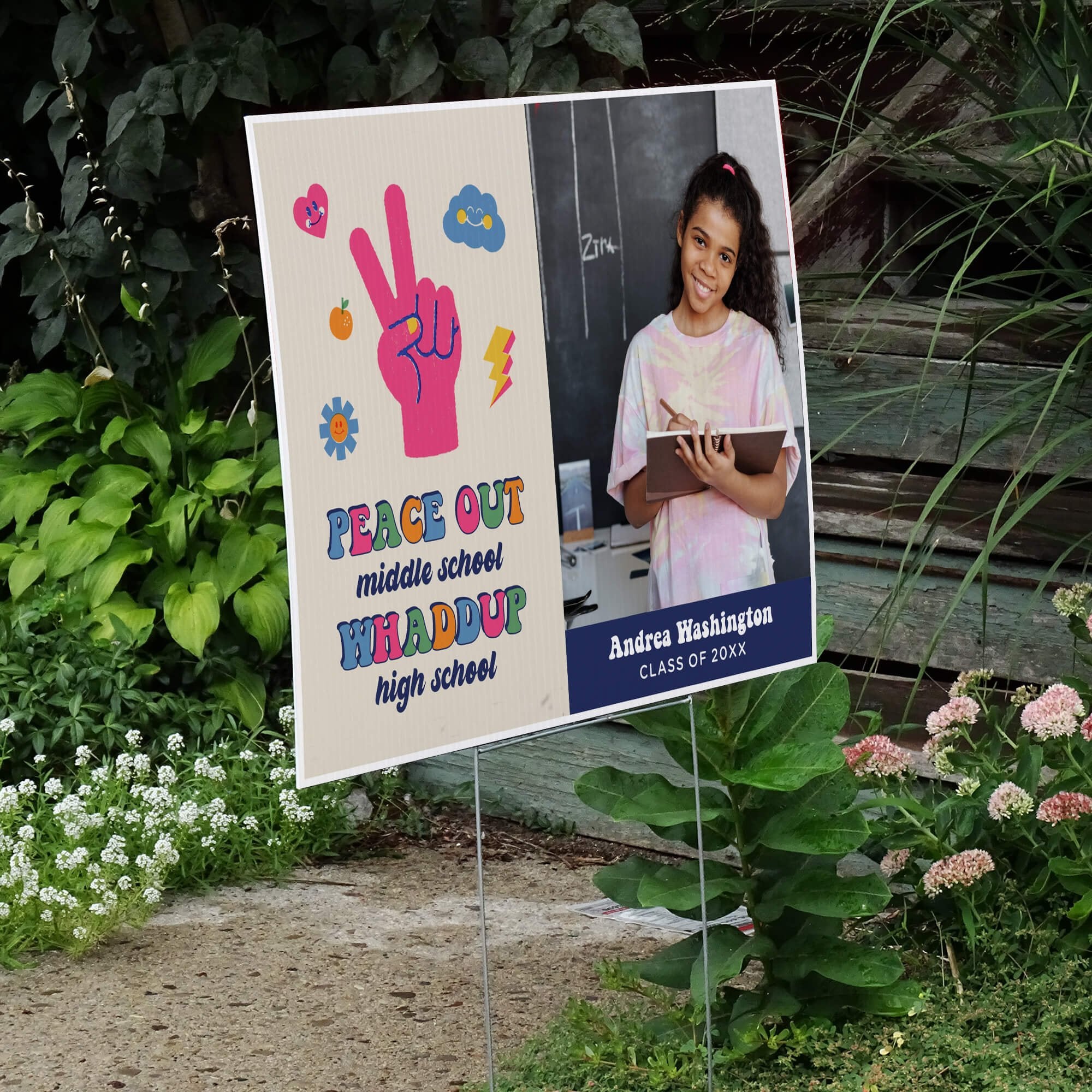 Peace out middle school graduation yard sign displayed next to stairs