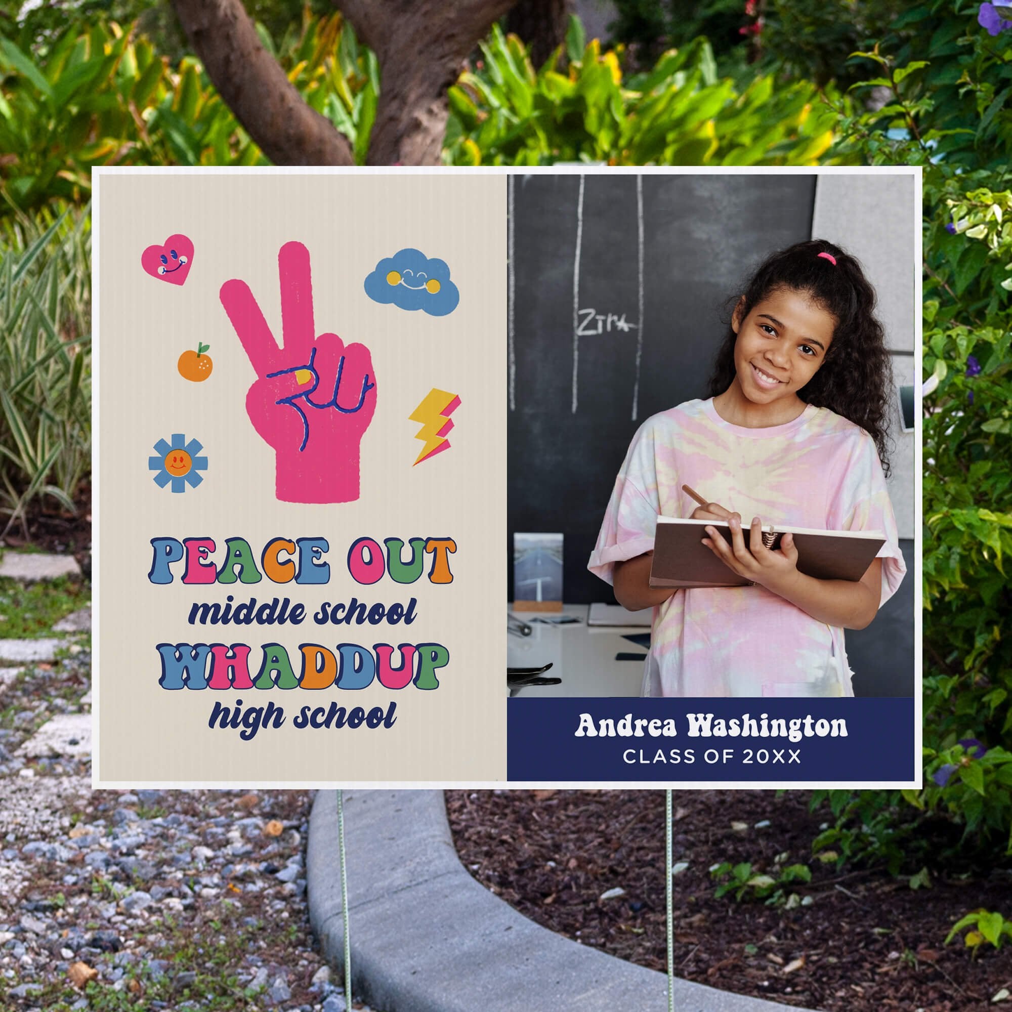 Peace out middle school graduation yard sign displayed next to pavement