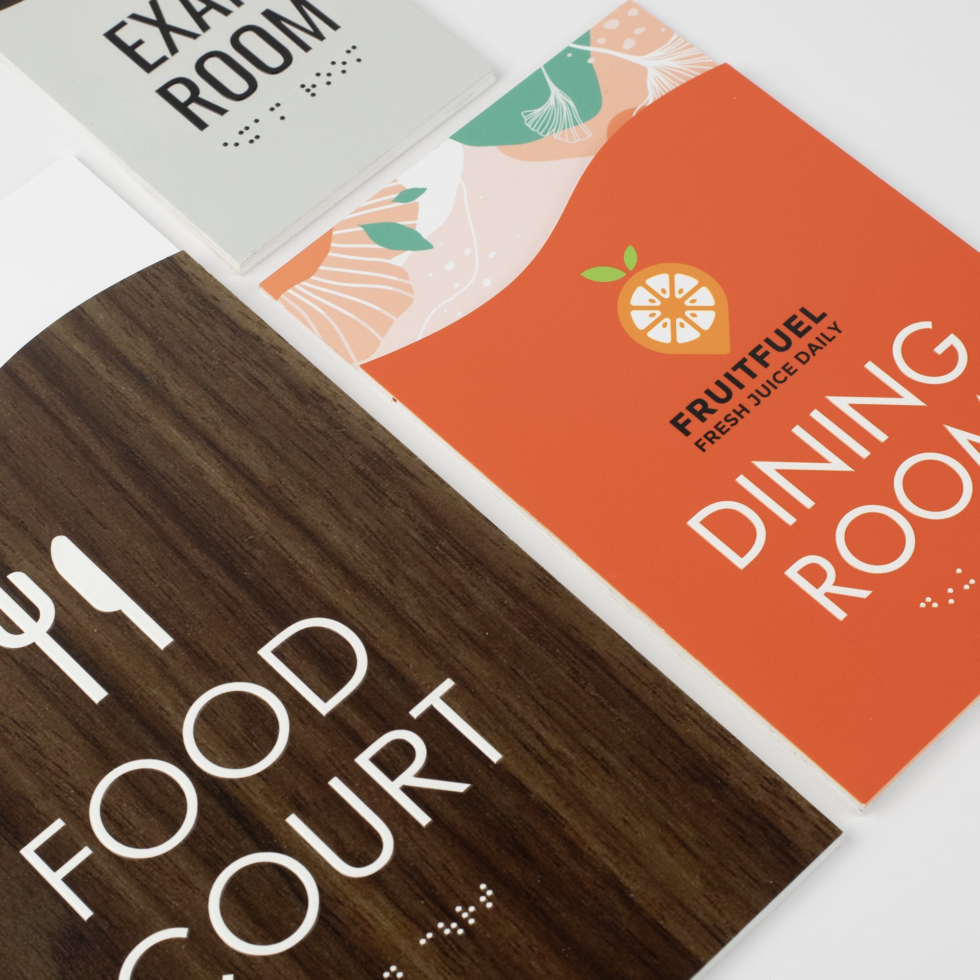 Various Sizes of Modern FLow ADA Signs Displayed Next to Each Other Various Sizes of Modern FLow ADA Signs Displayed Next to Each Other