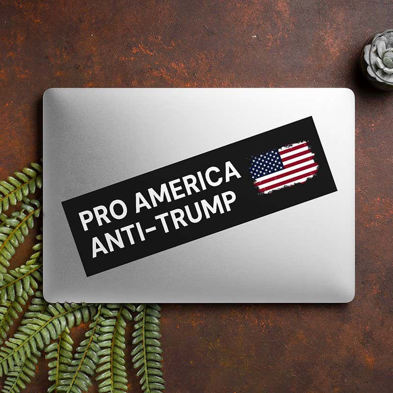 Pro America Anti Trump bumper sticker on a closed laptop