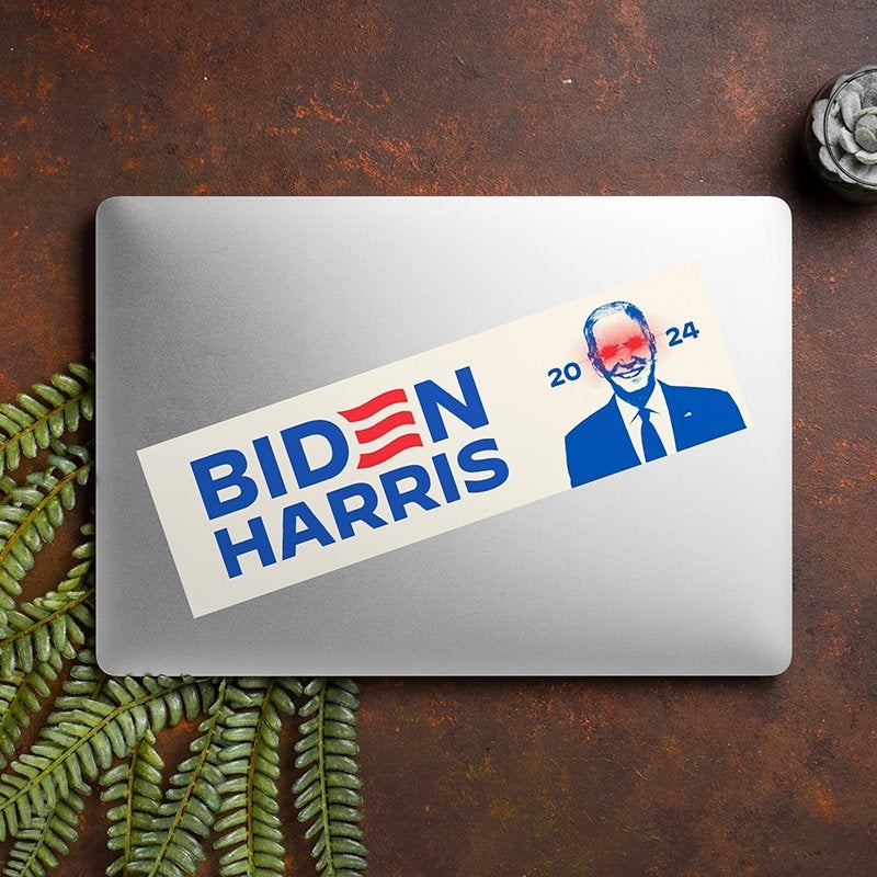 Dark Brandon Bumper Sticker on a closed laptop