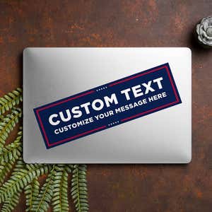MAGA Custom Trump Bumper Sticker on a closed laptop
