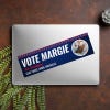 Custom Round Photo Political Bumper Sticker on a closed laptop