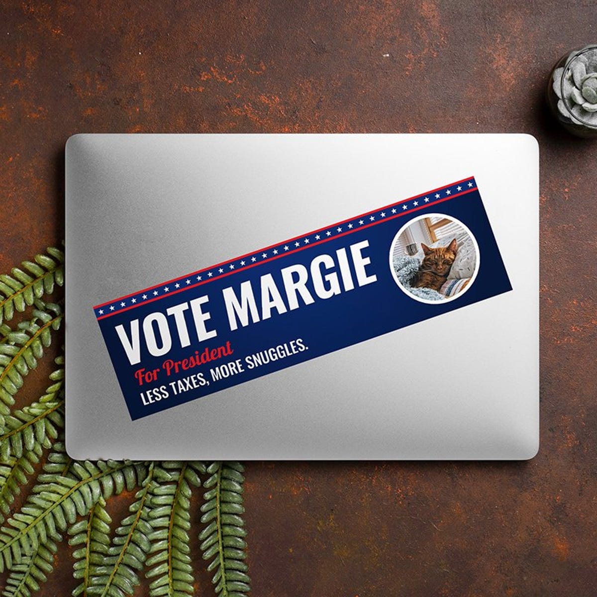 Custom Round Photo Political Bumper Sticker on a closed laptop