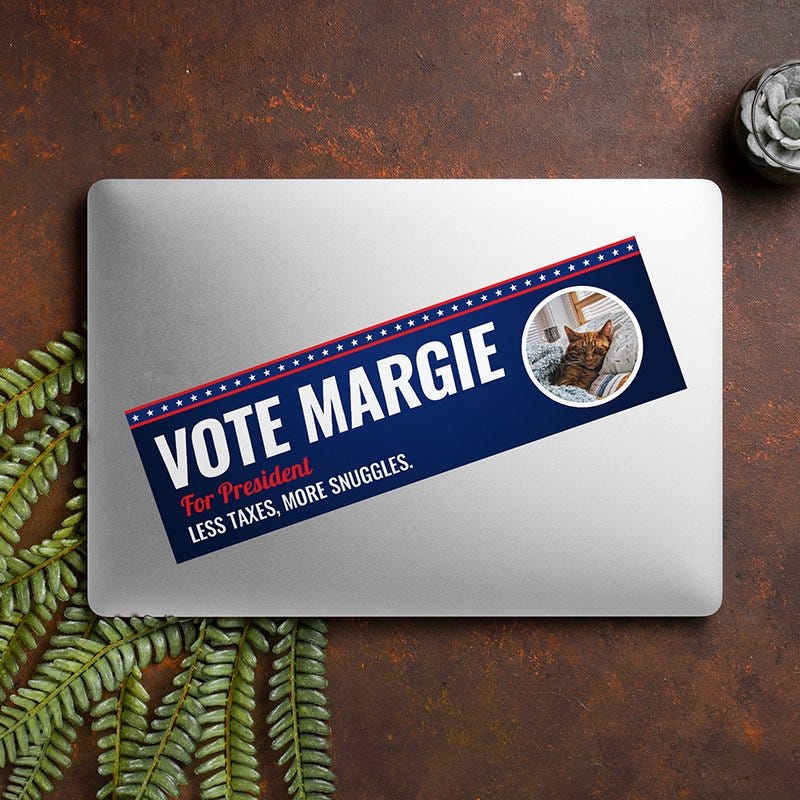 Custom Round Photo Political Bumper Sticker on a closed laptop