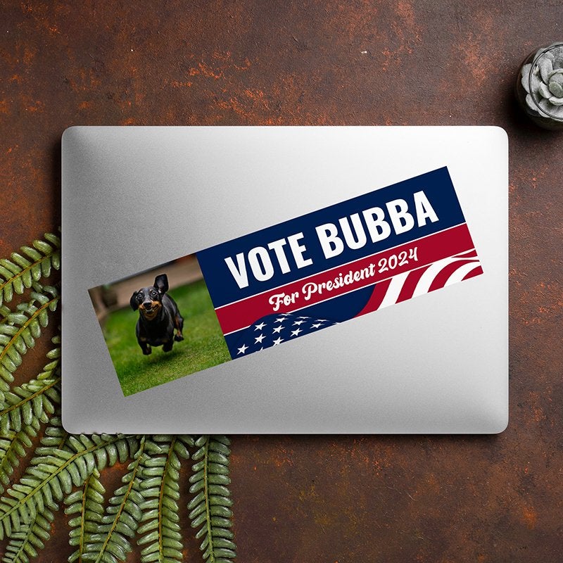 Custom Photo Political Bumper Sticker on a closed laptop