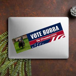 Custom Photo Political Bumper Sticker on a closed laptop
