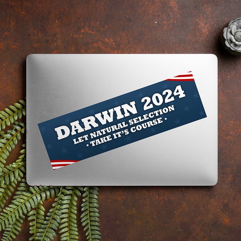Darwin Political Bumper Sticker on a closed laptop