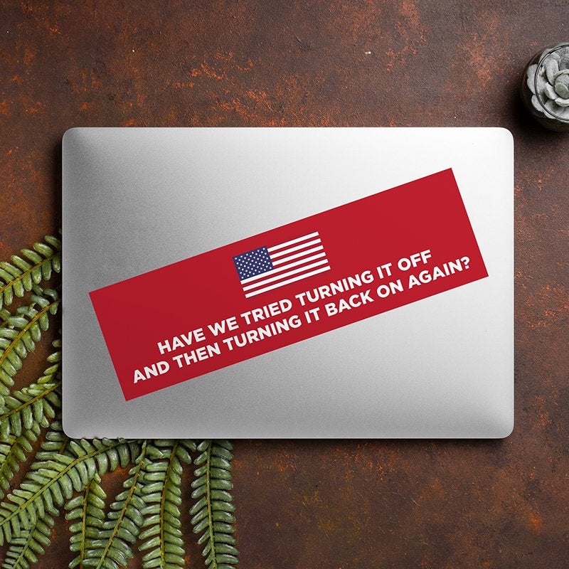 American Flag Funny Political Bumper Sticker on a closed laptop