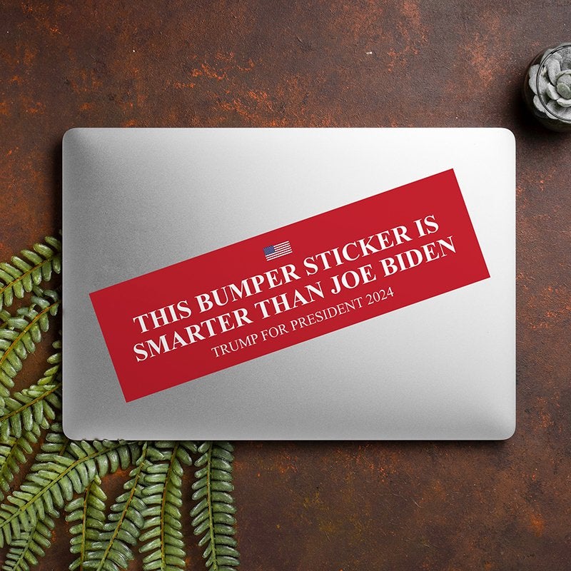 Smarter Than Biden Bumper Sticker on a closed laptop