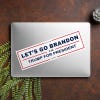 Let's Go Brandon Bumper Sticker on a closed laptop