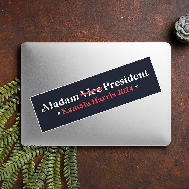 Madam President | Harris Bumper Sticker on a closed laptop
