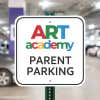 An Aluminum Sign for Parent Parking Mounted on a Sign Post