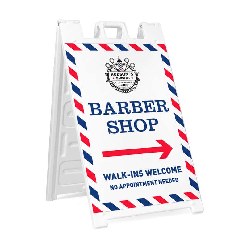 Barber shop A-frame sidewalk sign in white plastic frame, angled view