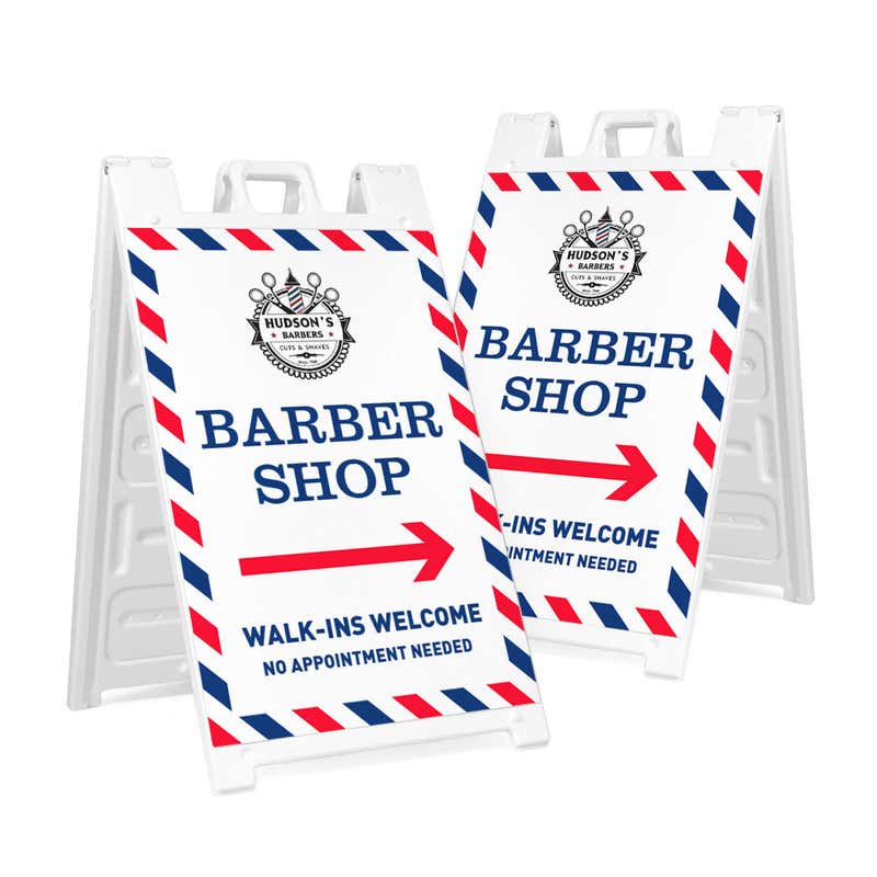 Two barber shop A-frame sidewalk signs shown front and angled