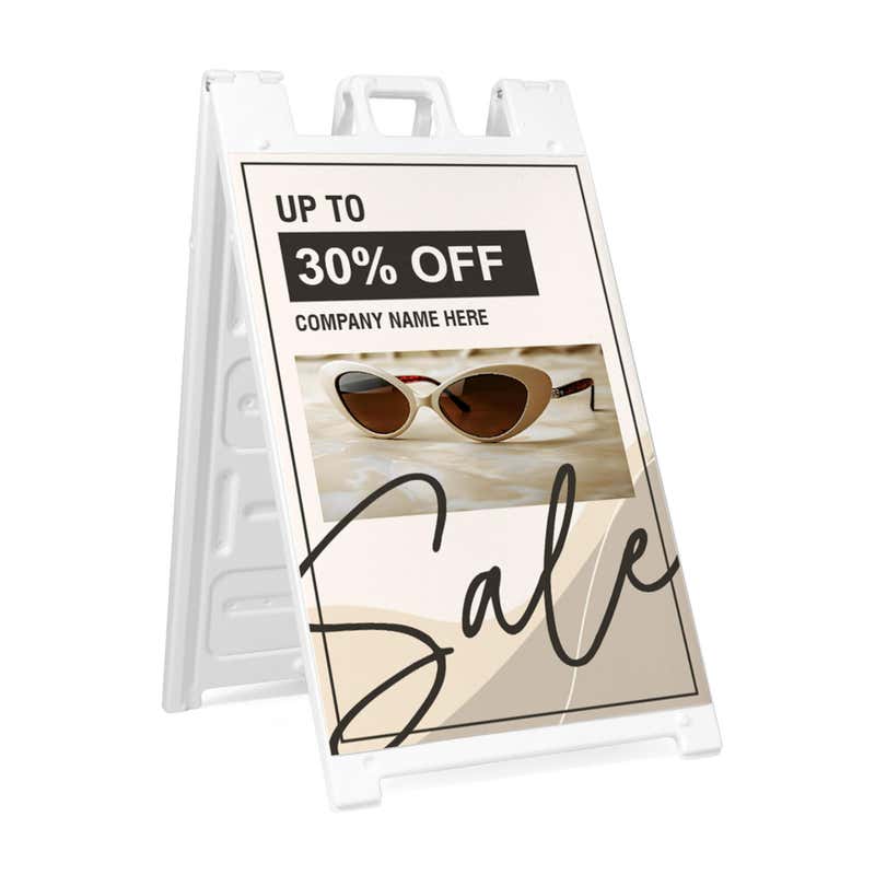 Beige sale A-frame sidewalk sign in white plastic frame, angled view