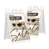 Two beige sale A-frame sidewalk signs shown front and angled