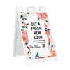 Fresh look salon A-frame sidewalk sign in white plastic frame, angled view
