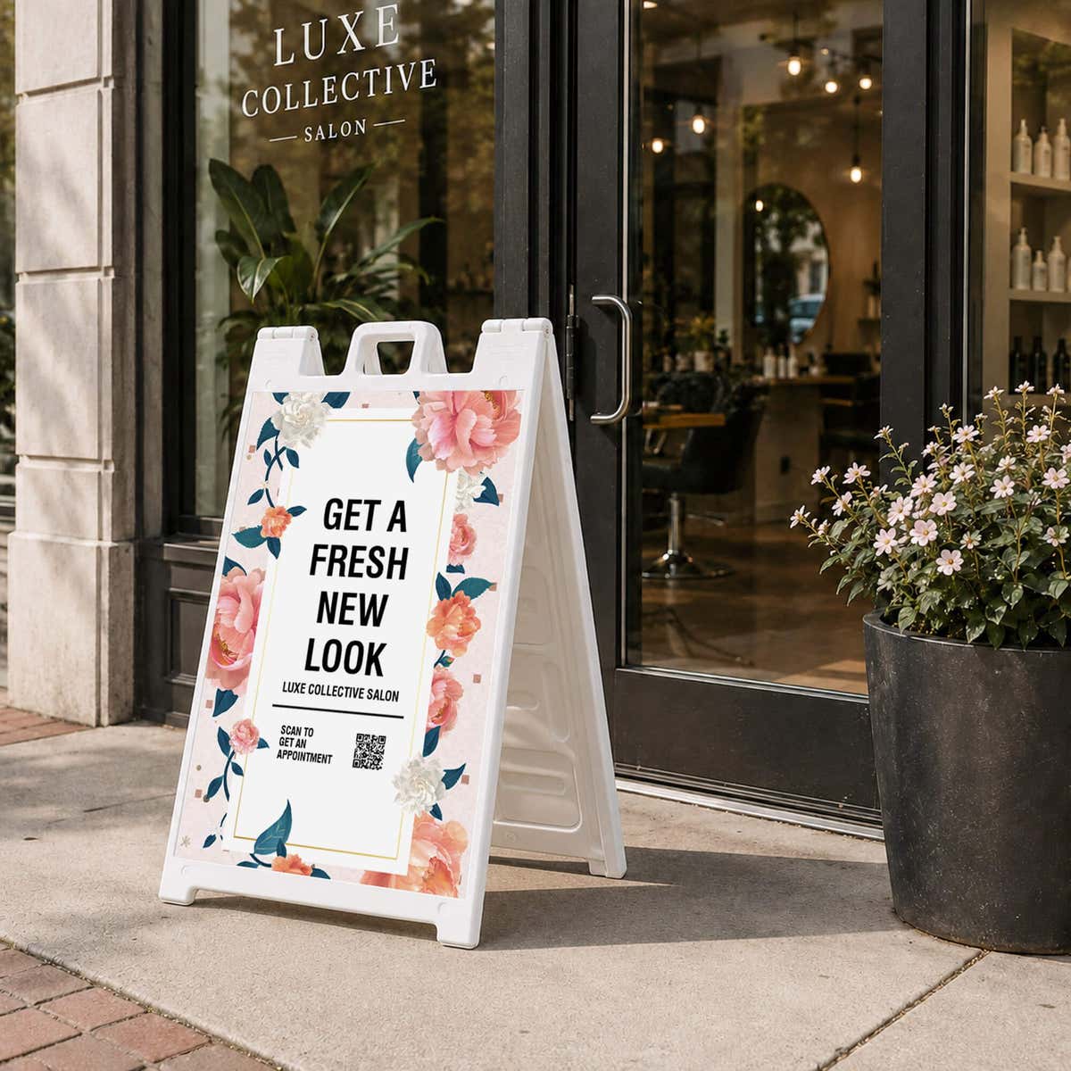 Fresh look salon A-frame sidewalk sign displayed in front of a store