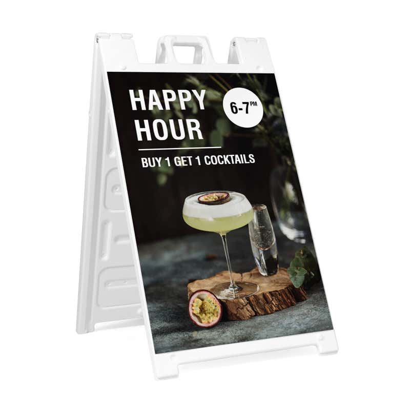 Happy hour A-frame sidewalk sign in white plastic frame, angled view