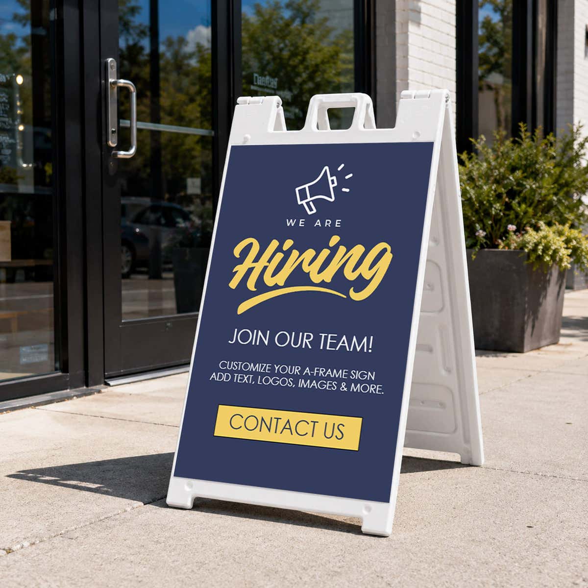 Blue now hiring A-frame sidewalk sign displayed in front of a business