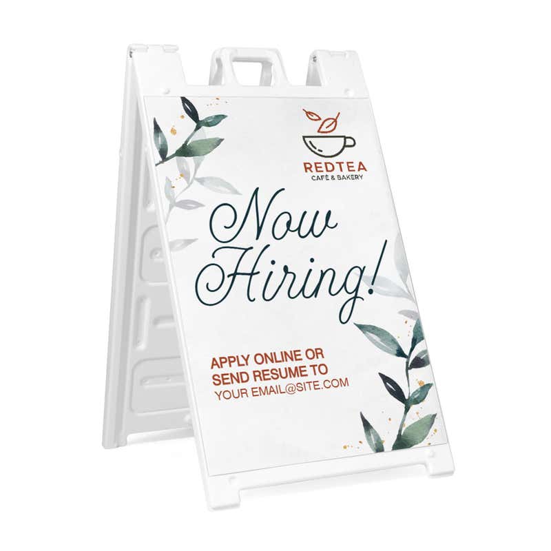Floral now hiring A-frame sidewalk sign in white plastic frame, angled view