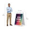 Rainbow now hiring A-frame sign shown with size dimensions beside a man