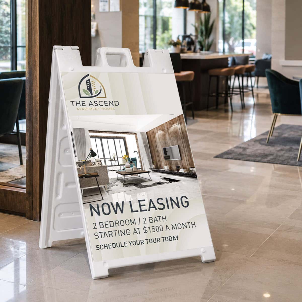 Now leasing A-frame sign at an apartment leasing office