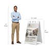 Now leasing A-frame sign shown with size dimensions beside a man