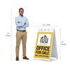 Office for sale A-frame sign shown with size dimensions beside a man