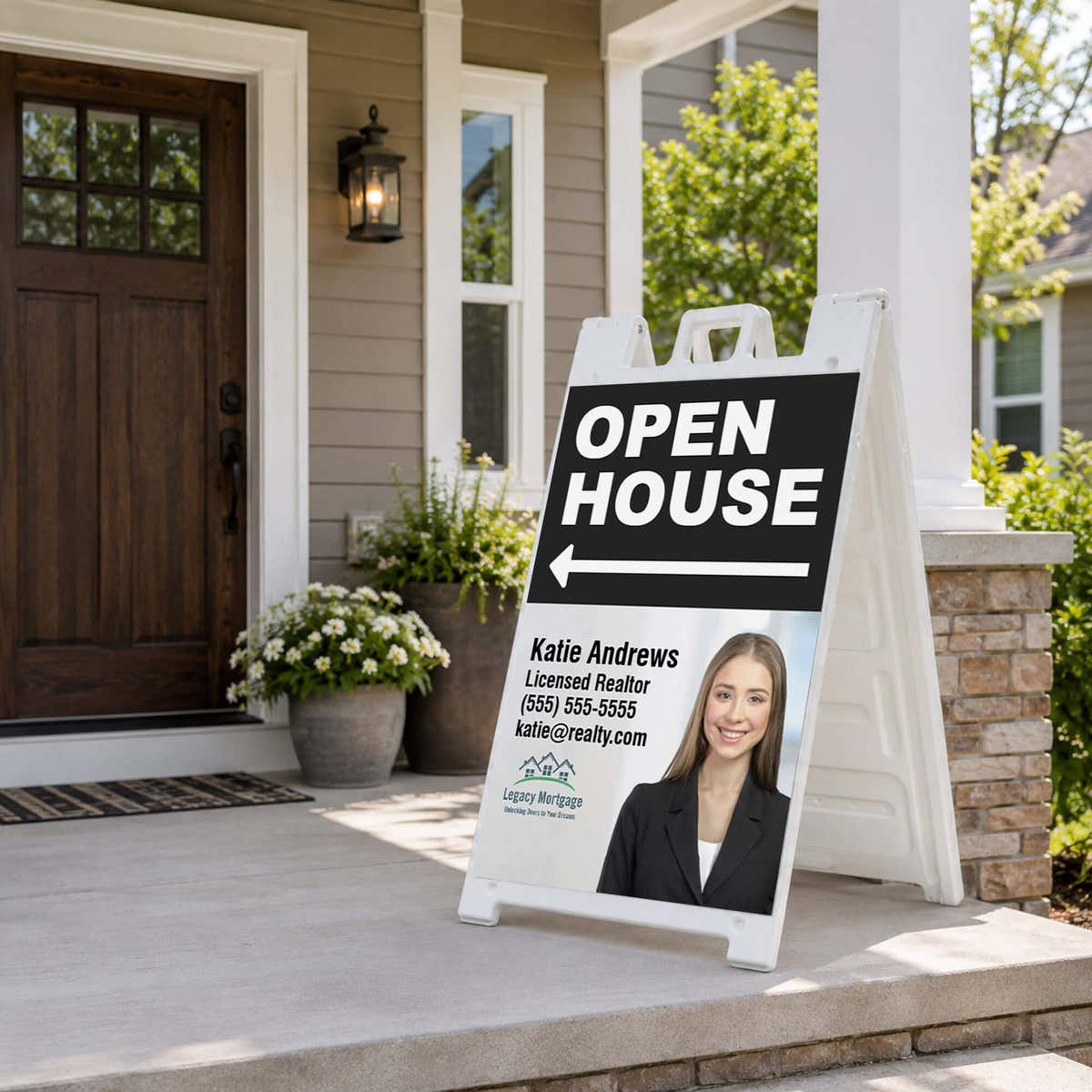 Black open house real estate A-frame sign on a home front porch