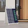 Patterned open house real estate A-frame sign on a home front porch