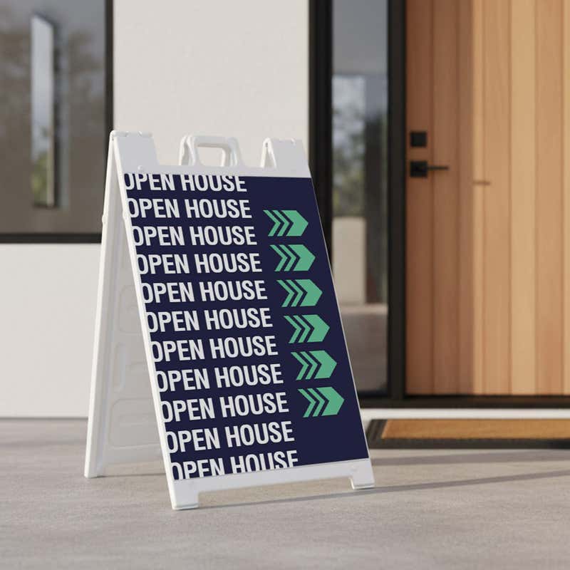 Patterned open house real estate A-frame sign on a home front porch