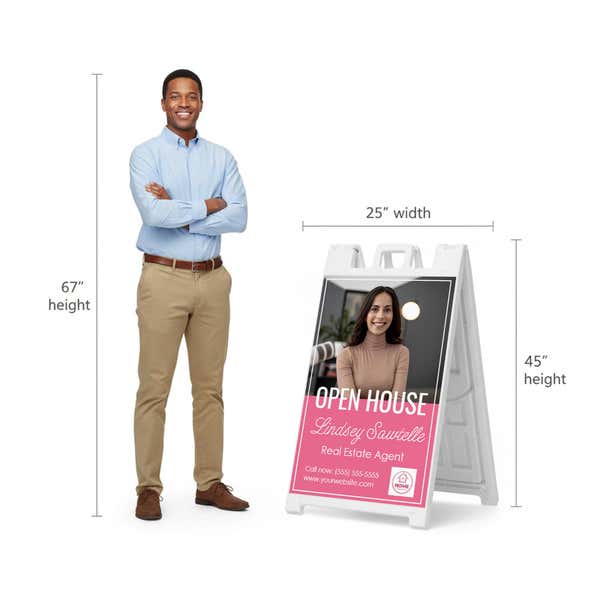 Pink open house A-frame sign shown with size dimensions beside a man