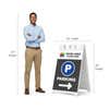 Logo parking A-frame sign shown with size dimensions beside a man
