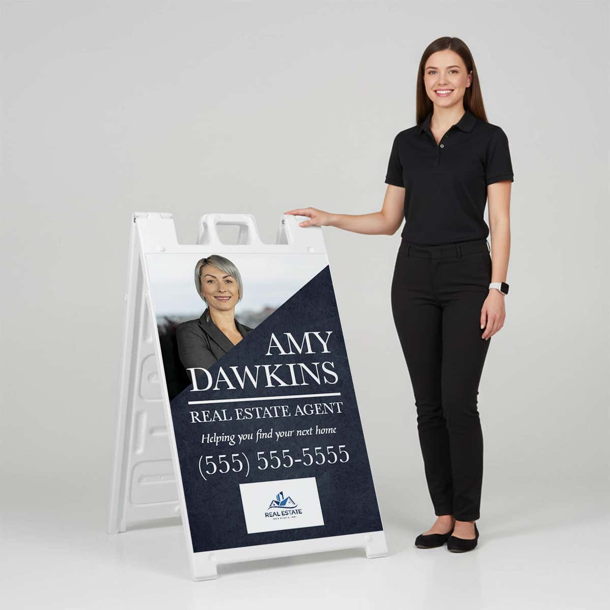 Woman standing beside a diagonal real estate A-frame sign for scale