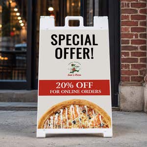 Special offer A-frame sign standing on a sidewalk