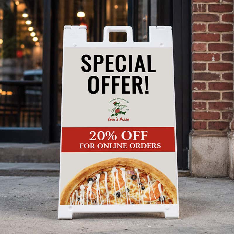 Special offer A-frame sign standing on a sidewalk