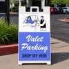 Valet parking A-frame sign displayed in a parking lot