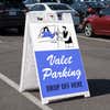 Valet parking A-frame sign displayed in a parking lot