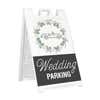 Wedding parking A-frame sidewalk sign in white plastic frame, angled view