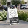 Wedding parking A-frame sign displayed in a parking lot