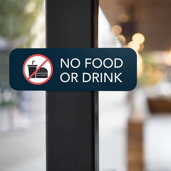 An Aluminum Sign for No Food or Drink